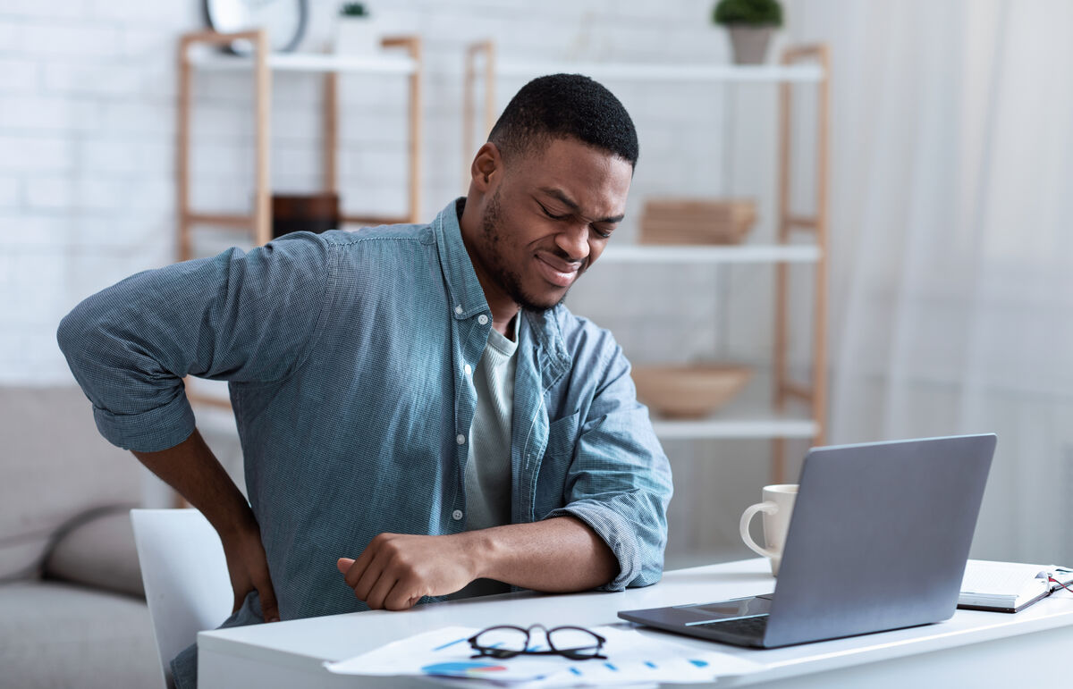 sore-back-from-work bad posture at work pain relief